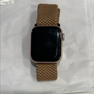 Apple Watch rose gold face with Woven Tan Band